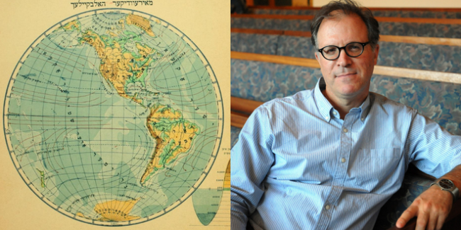 Map of the world in Yiddish with photo of man wearing blue button up shirt and black glasses
